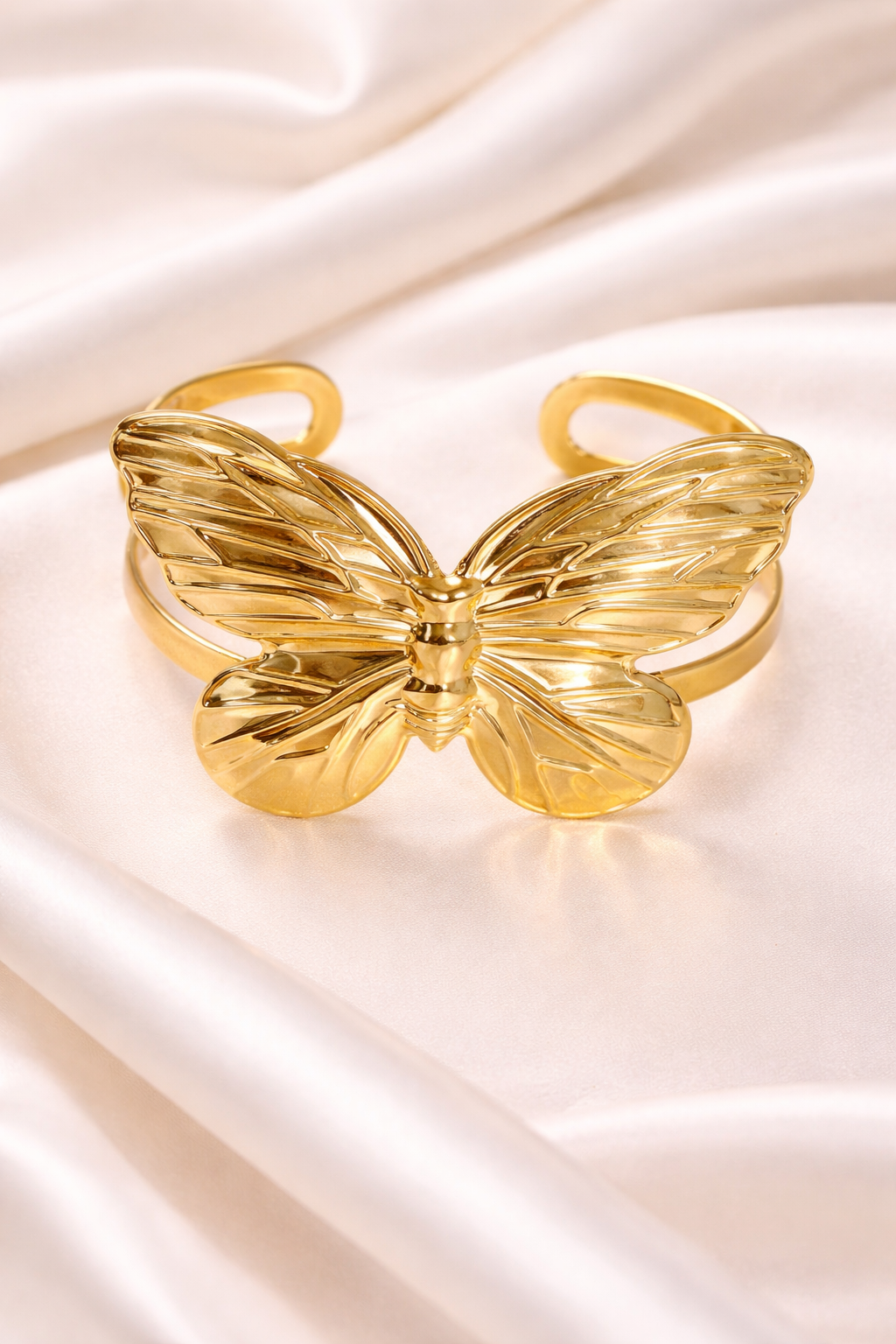 Butterfly cuff bangle adjustable.